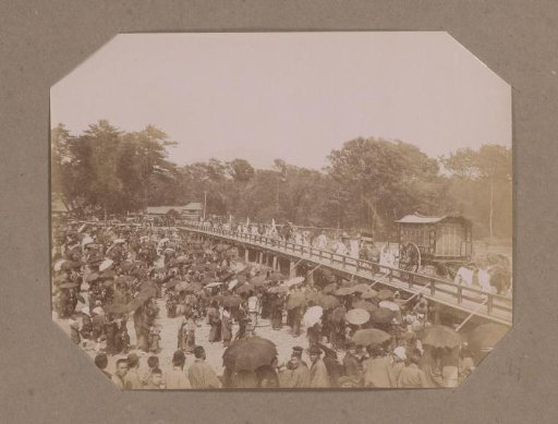 Procession over a Bridge with Spectators Holding Parasols in Japan