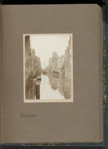 View through the Voorstraatshaven with the Pelserbrug and the Grote Kerk in Dordrecht