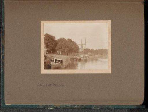 View of the Nieuwe Veerstal in Gouda with the windmill 't Slot