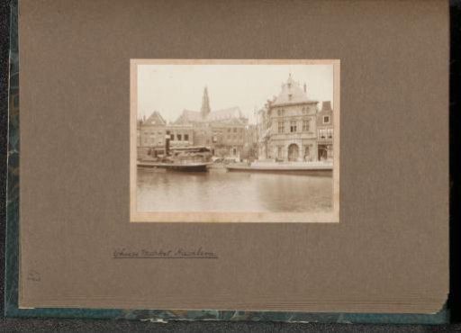Waag building at the Spaarne at Haarlem with the Sint-Bavokerk in the background