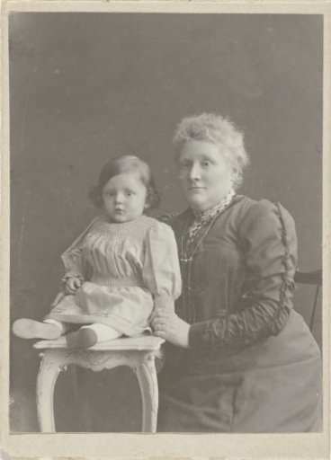 Studio portrait of mother with daughter