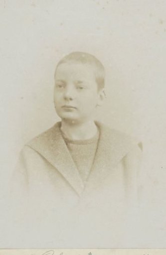 Studio portrait of David Vermeulen in a sailor's suit