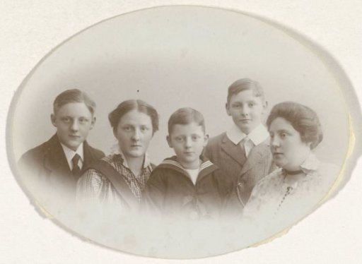 Studio portrait with two young women and three boys