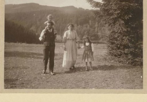 Waldemar Titzenthaler, the photographer, with his wife Olga and children Marba and Eckart in a field