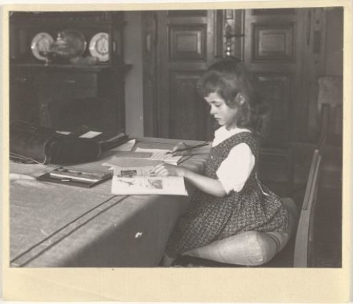 Marba Titzenthaler, Daughter of the Photographer, Writing in the Residence on Friedrichstrasse, Berlin