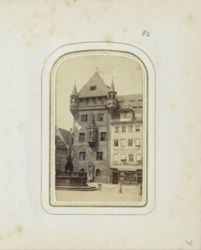 Lorenz Ritter Platz in Nuremberg with the Nassauer Haus and Tugendbrunnen on the left, and the toy shop of Johann Friedrich Alt on the right