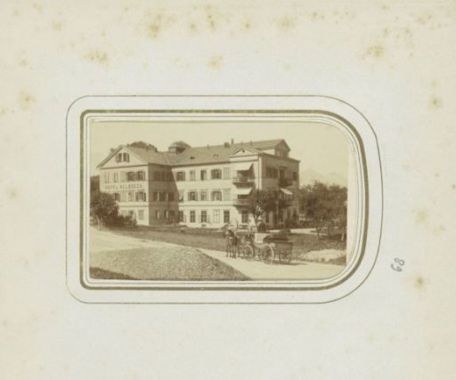Exterior of the Hotel Nelboeck in Salzburg with a horse-drawn carriage in front