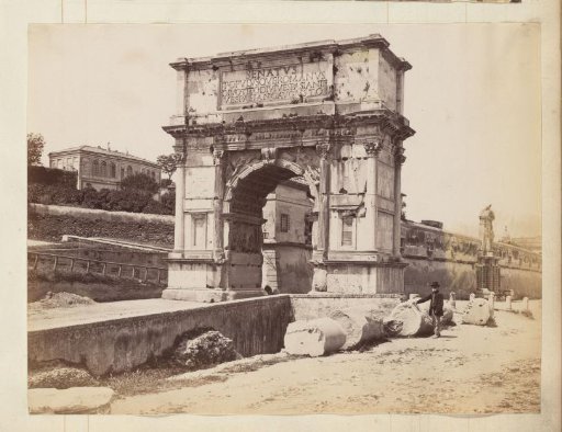 Man Posing at the Arch of Titus on the Roman Forum in Rome