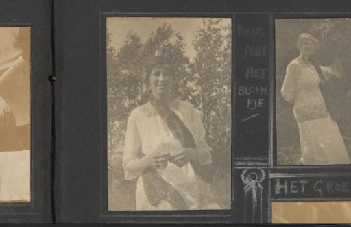 Woman in a White Dress with a Flower in Her Hands