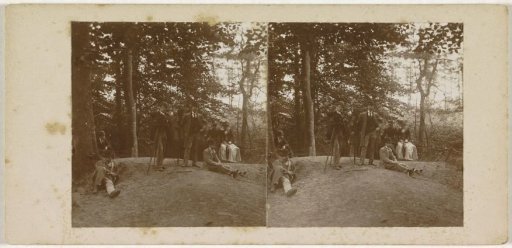 Group of amateur photographers including two women (AFV) with cameras on a club outing in the woods, on the right front probably Michel Ameschot