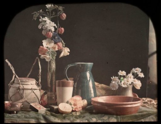 Still life with flowers, fruit, vases, and earthenware