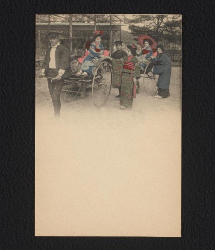Four Japanese women with two rickshaws, pulled by two men