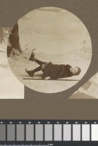 Portrait of a boy with skates lying on his back
