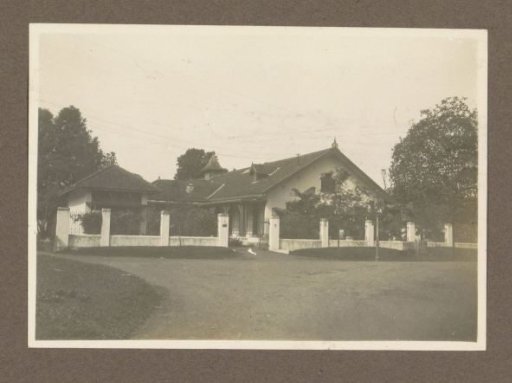 View of a house on a road in the Dutch East Indies