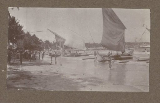 Sailing Ships and People on a Beach in the Dutch East Indies