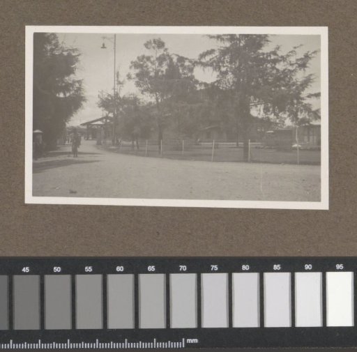 Buildings and road, possibly near a plantation in the Dutch East Indies