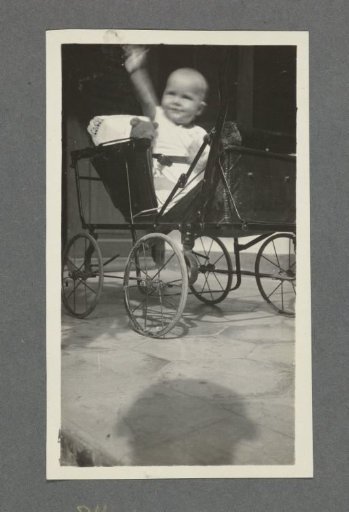 Eight-and-a-half-month-old baby Klaas Kleiterp in a pram in Batavia