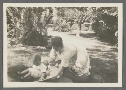 Tine Kleiterp-Vermeulen and her children Klaas and Tiny in a garden in Pangka on Java