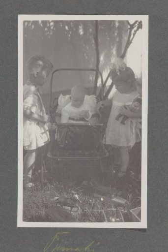 Klaas and Tiny Kleiterp and baby Pieteke in a pram in Tjimahi