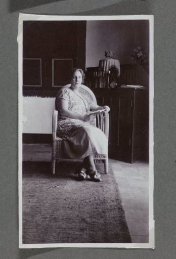 Portrait of Tine Kleiterp-Vermeulen seated in a chair in Adiwerna, Java