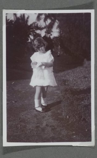 Portrait of Tiny Kleiterp as a toddler, standing on a path in Adiwerna, Java