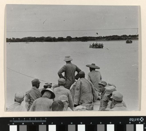 Soldiers in Boats on a River, China