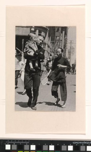 Married couple with child on the street during the Second Sino-Japanese War, China
