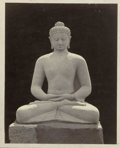 Buddha statue in dhyanamudra from a niche of the Borobudur.