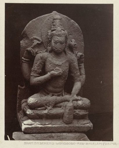 Statue of a seated four-armed Vishnu