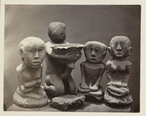 Terra cotta group holding two ithyphallic figures and two female figures with child. Karta Wangungan, Kuningan district, West Java province