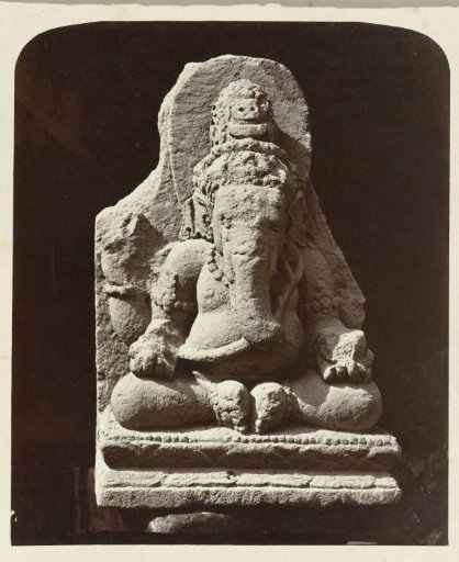 Four-armed Ganesha exhibited in the garden of the assistant-resident of Wonosobo (provenance: Dieng Plateau). Wonosobo, Wonosobo district, Central Java province, 10th century.