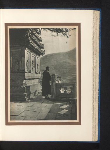 Unknown man looking out at mountains