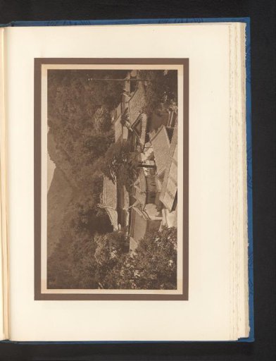 View of a landscape with mountains and roofs
