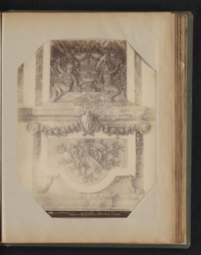 Two gilded panels above a door