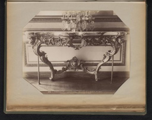Table of gilded wood, provided with carved and decorated edges and legs