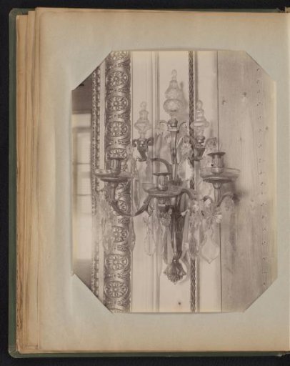 Bronze three-armed wall candelabrum decorated with crystal ornaments