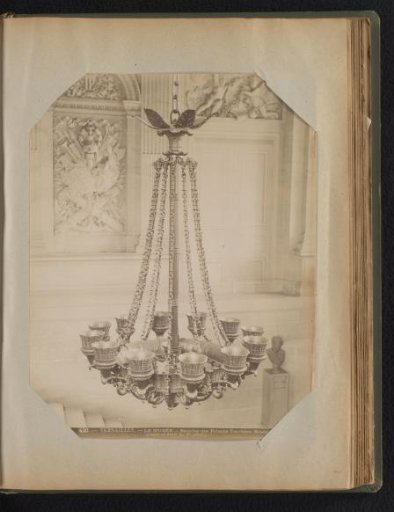 Bronze chandelier with candlesticks decorated with bronze petals