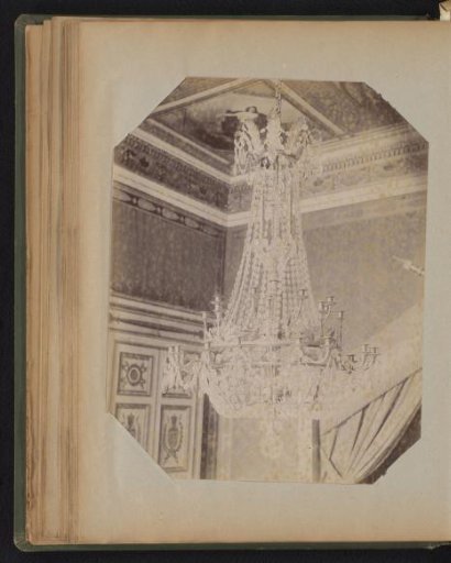 Bronze chandelier with openwork central stem
