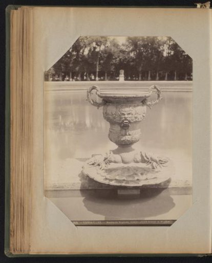 Bronze vase with water spouts integrated into the rim of a basin