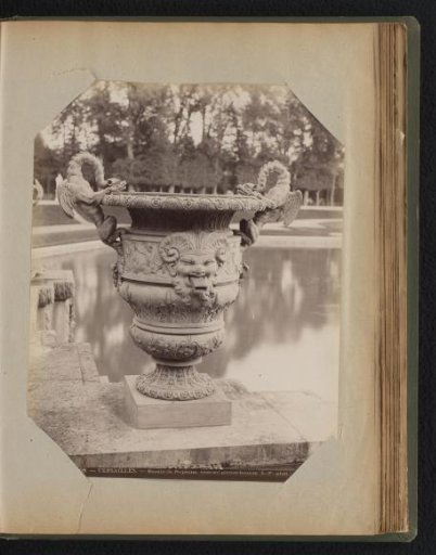 Bronze vase with water spouts integrated into the rim of a basin