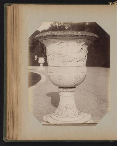 Garden vase with an allegorical representation in the garden of Versailles