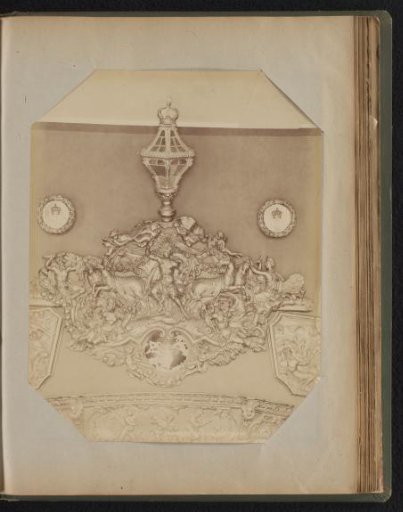 Gilded wall ornament depicting a mythical scene