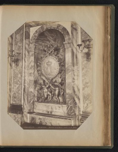 Shield carried by two angels with arrows, surmounted by two burning torches and an eagle, all in bronze