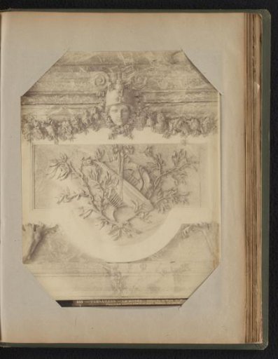 Gilded ornament above a door