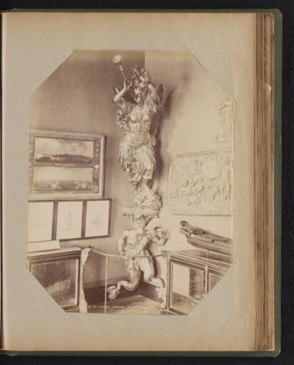 Statue with two figures blowing trumpets