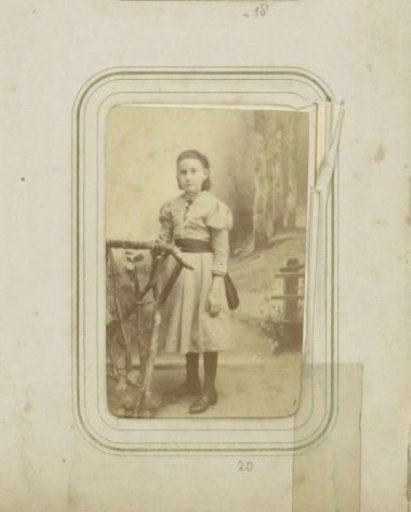 Portrait of a young girl in a dress