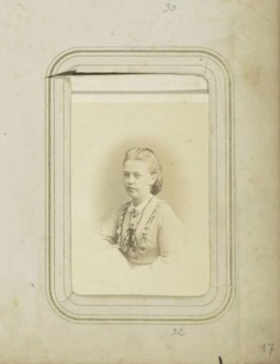 Portrait of a woman in a dress with her hair up