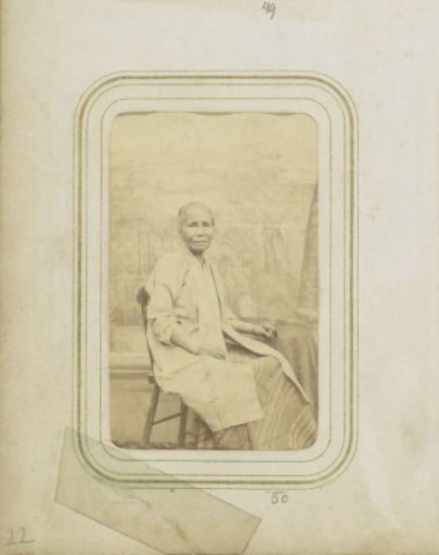 Portrait of a woman in a long coat