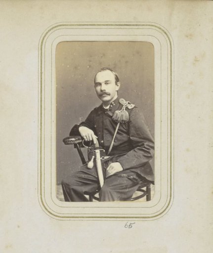 Portrait of a man with a mustache in military costume