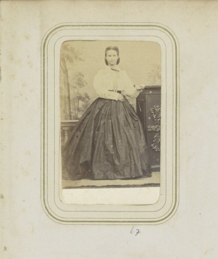 Portrait of a Woman in a Wide Skirt and a White Blouse